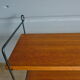 Wall shelve in black metal and the 1960s teak