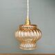 Vintage amber glass globe pendant light