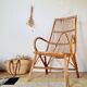 Fauteuil ancien en rotin large dossier
