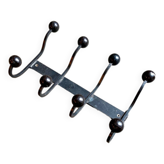 Wall-mounted coat rack with 4 hooks in black cast iron