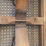 Folding stool in old caning