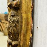 Large golden oval mirror
