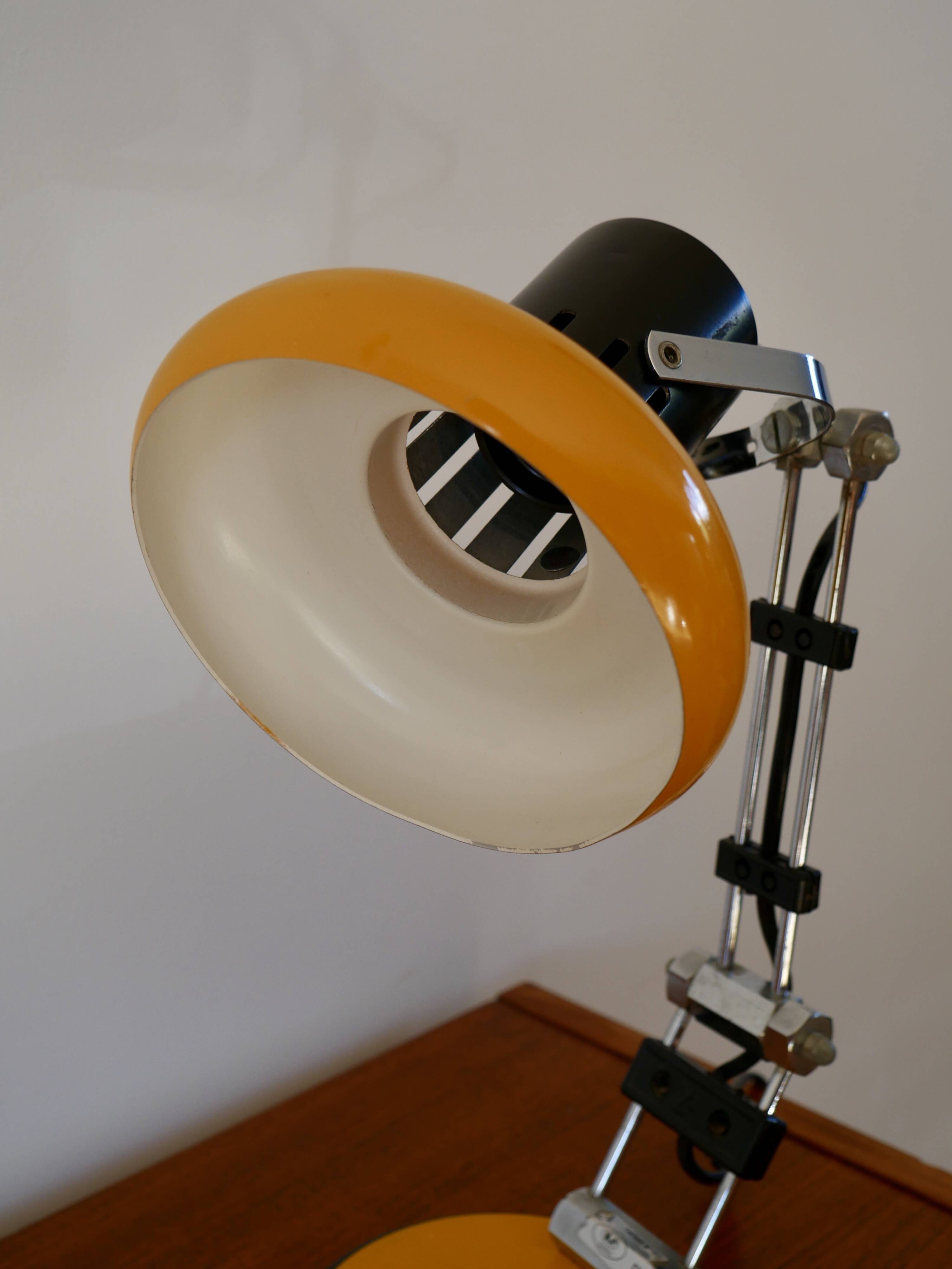 Articulated orange Aluminor desk lamp industrial design 70s
