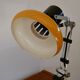 Articulated orange Aluminor desk lamp industrial design 70s