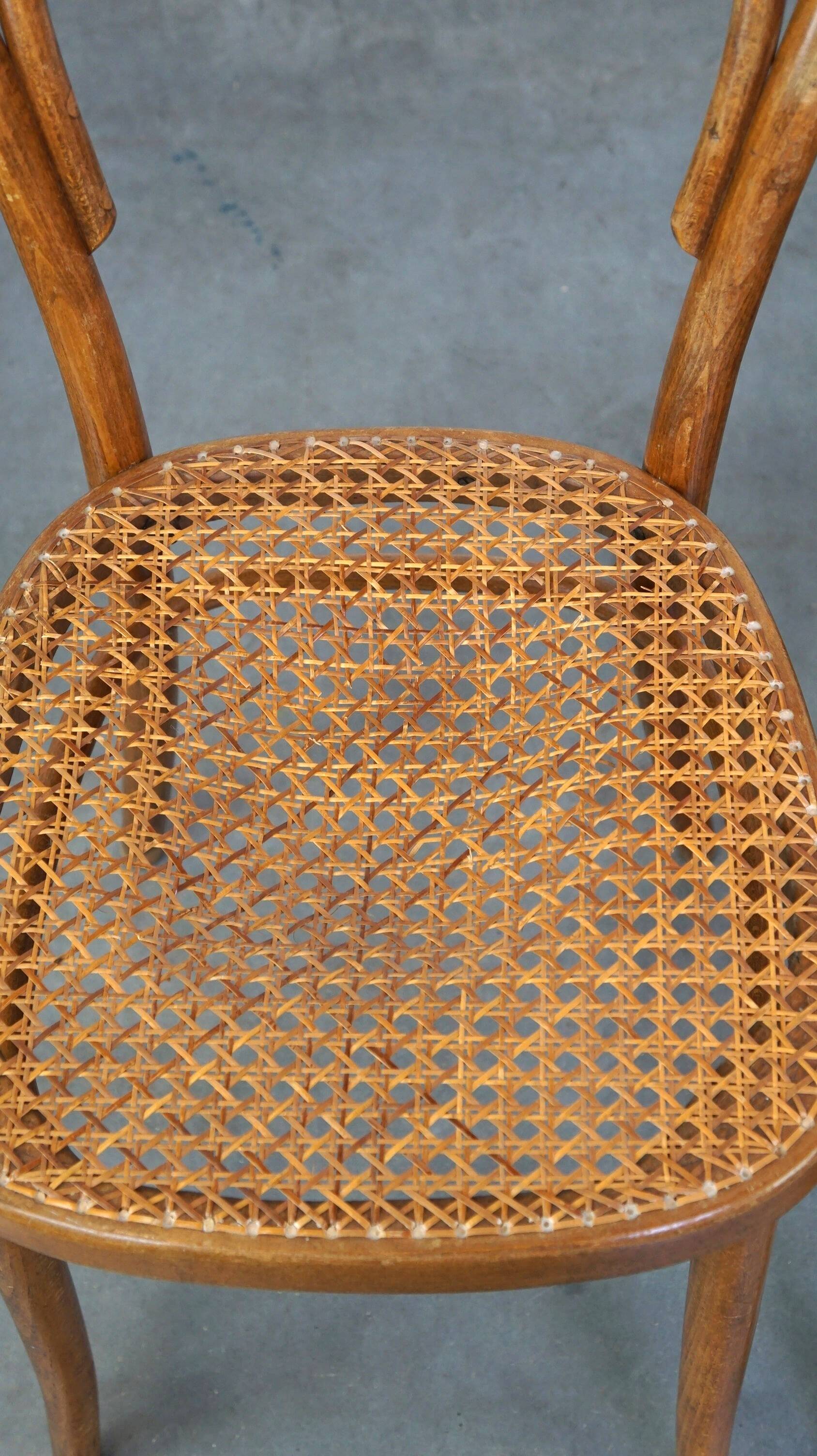 Lovely set of 2 brown vintage bistro chairs with woven seats