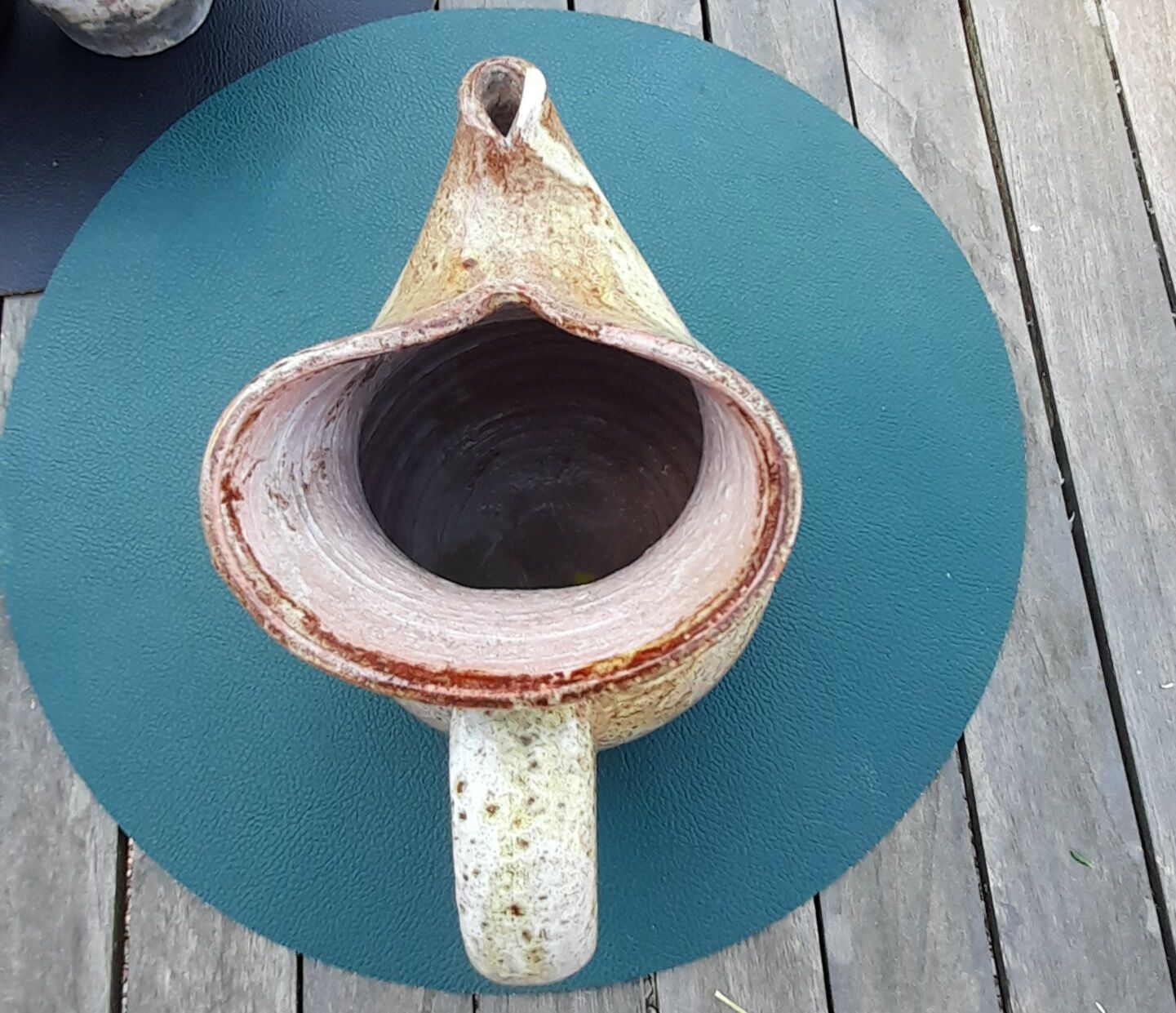 Old cider pitcher in varnished sandstone early 20th century