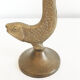 Old golden brass fish candlestick