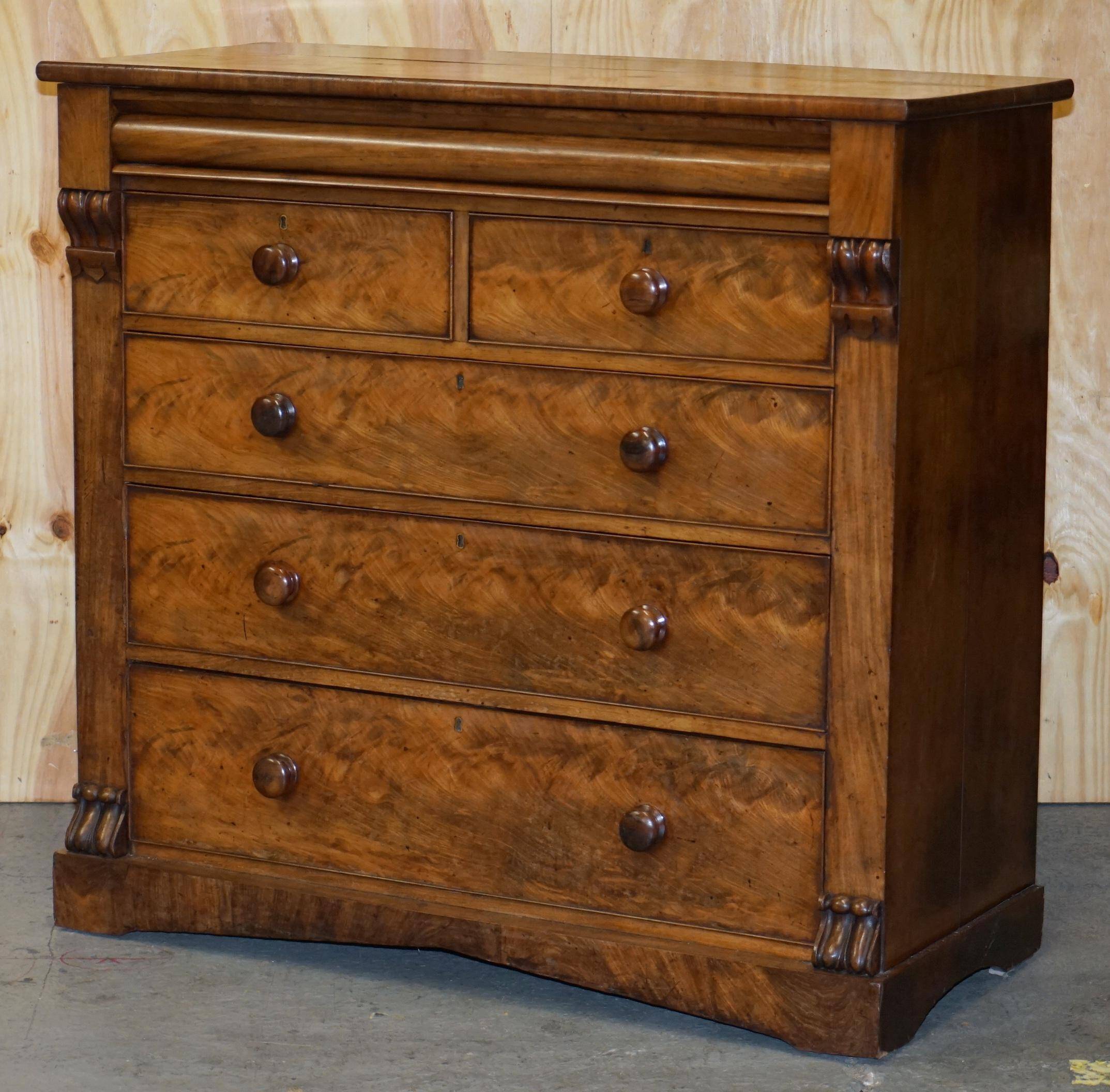 Victorian flamed hardwood commode from the 19th century with a hidden drawer.