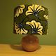Solid wood ball lamp, lampshade with stylised wax flowers in khaki/yellow.