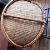 Rattan satellite armchair from the 1950s