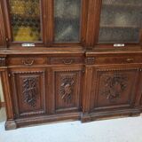 Glass-fronted walnut bookcase