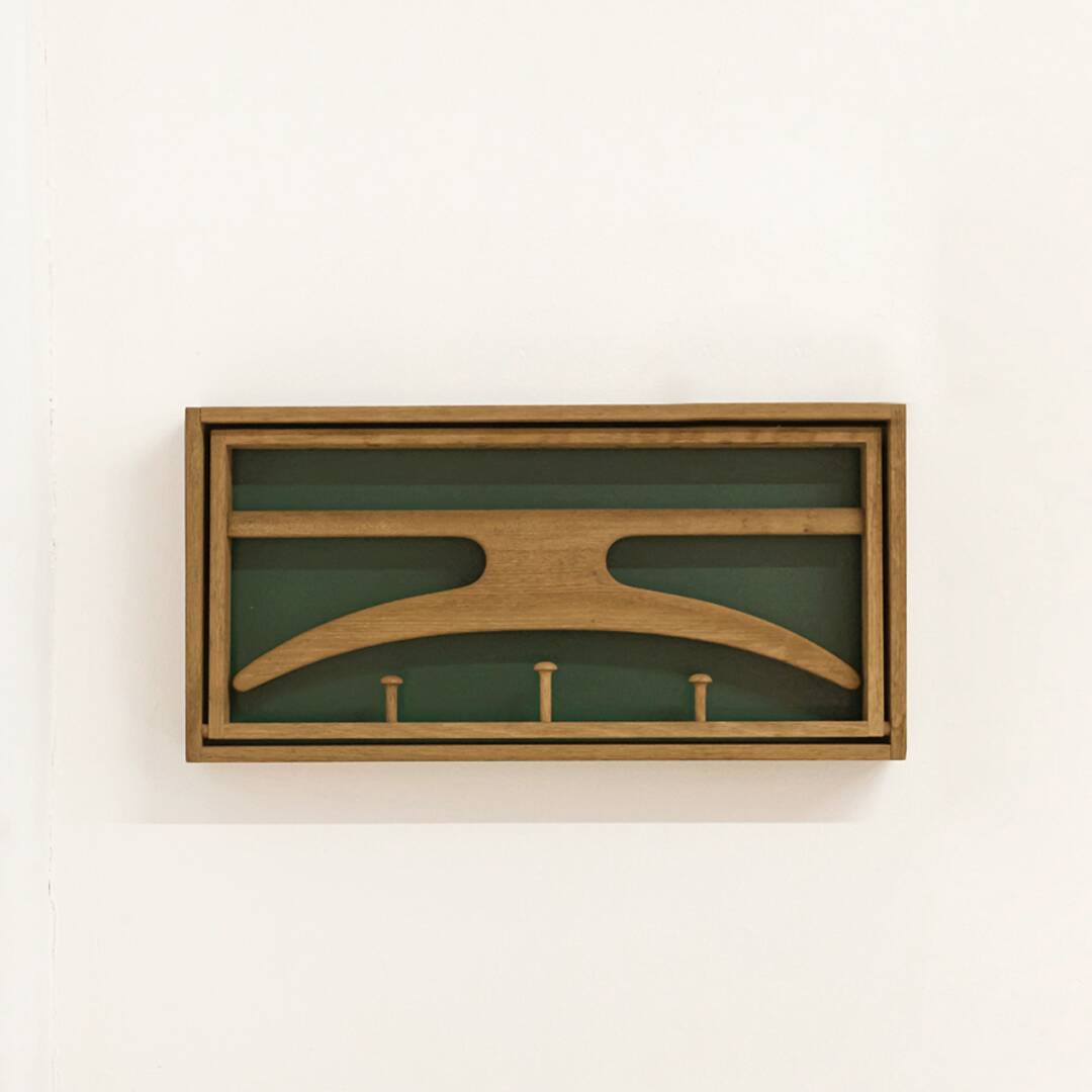 Valet coat rack designed by Adam Hoff (born 1932) and Poul Østergaard (born 1933).