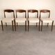 Set of 4 Scandinavian chairs in teak and fabric.