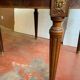 Louis XVI style table in mahogany and light wood 20th century