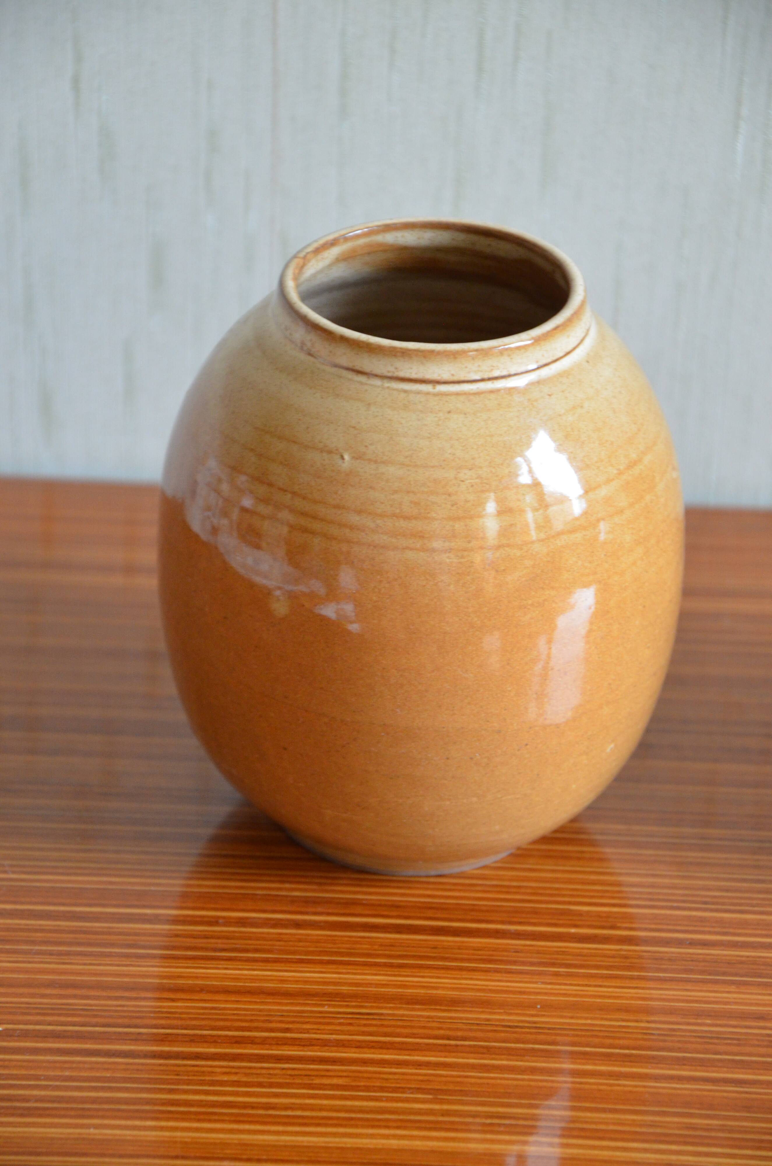 Small varnished sandstone vase