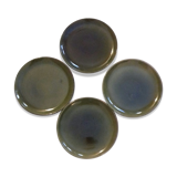 Suite of four green varnished plates