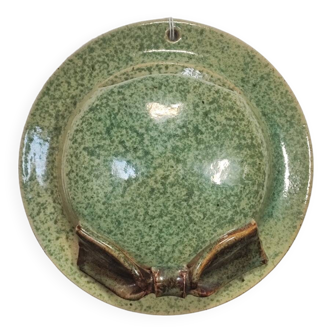 Green speckled glazed stoneware wall vase in the shape of a hat