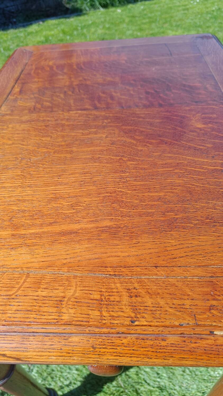 Antique solid wood table with a through drawer.