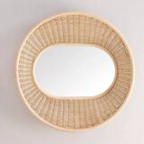 Large concave mirror in woven rattan