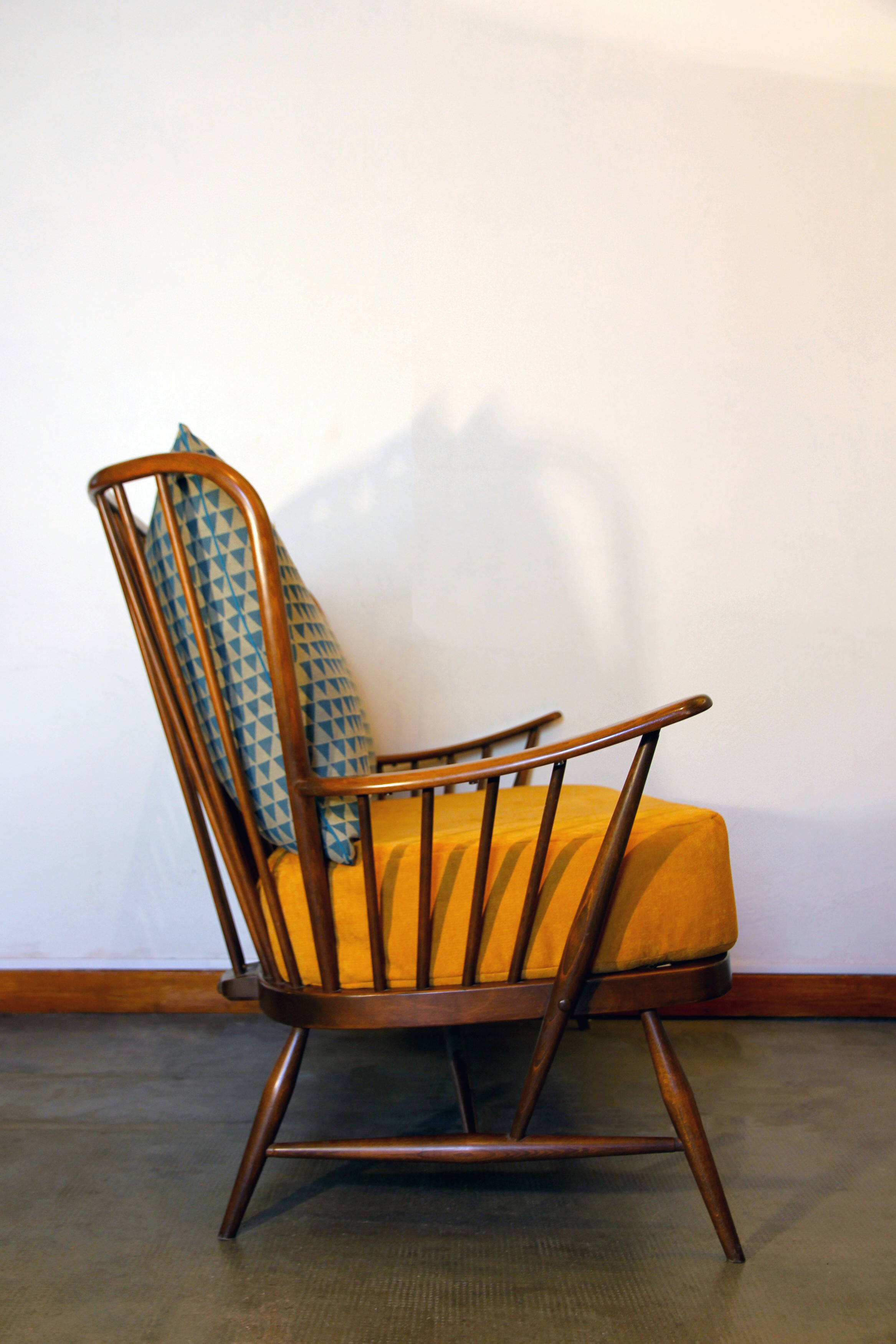 Ercol Springtime mustard yellow sofa