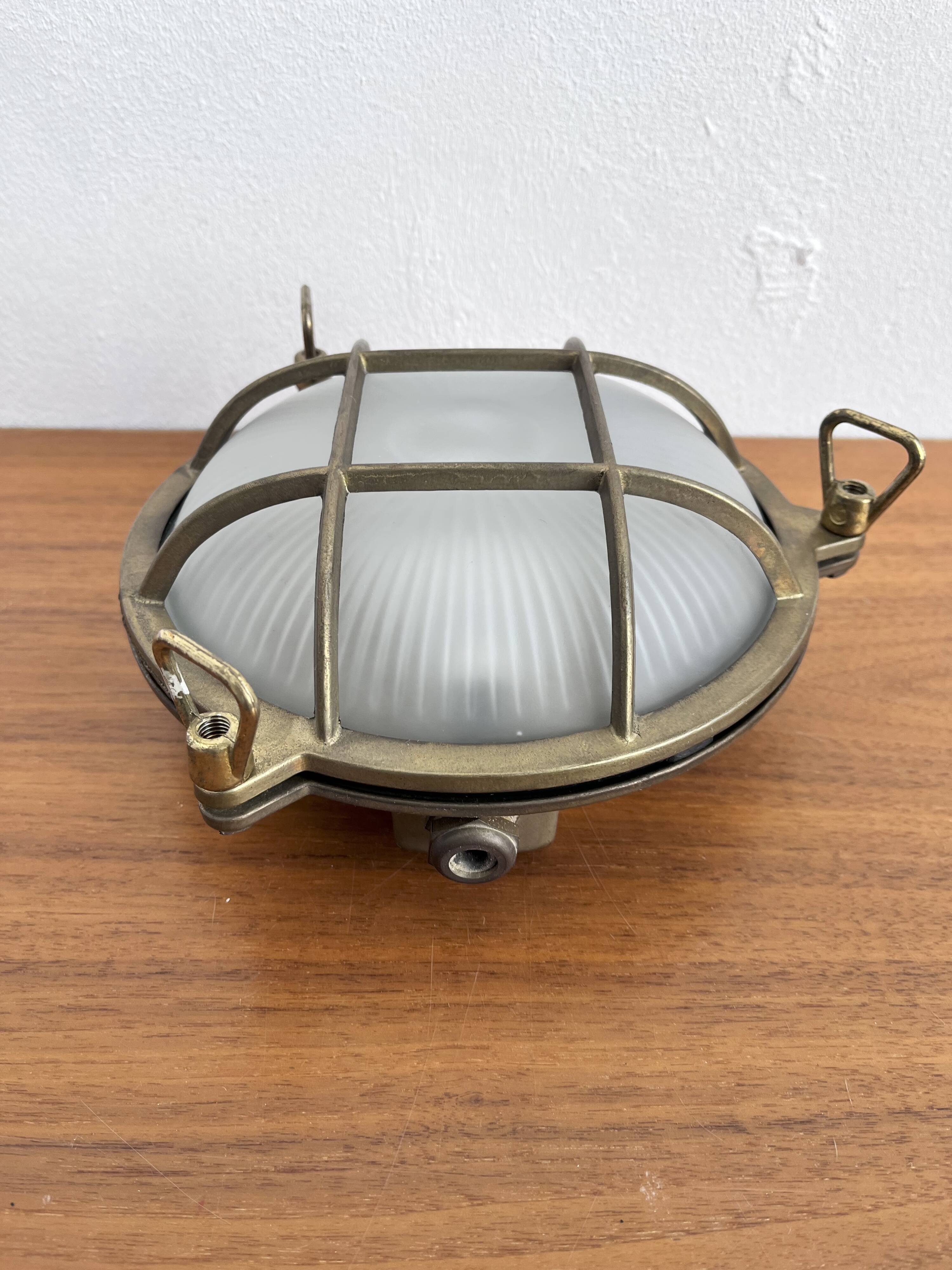 Marine decorative wall light in solid brass