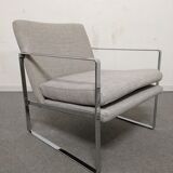 Pair of designer armchairs