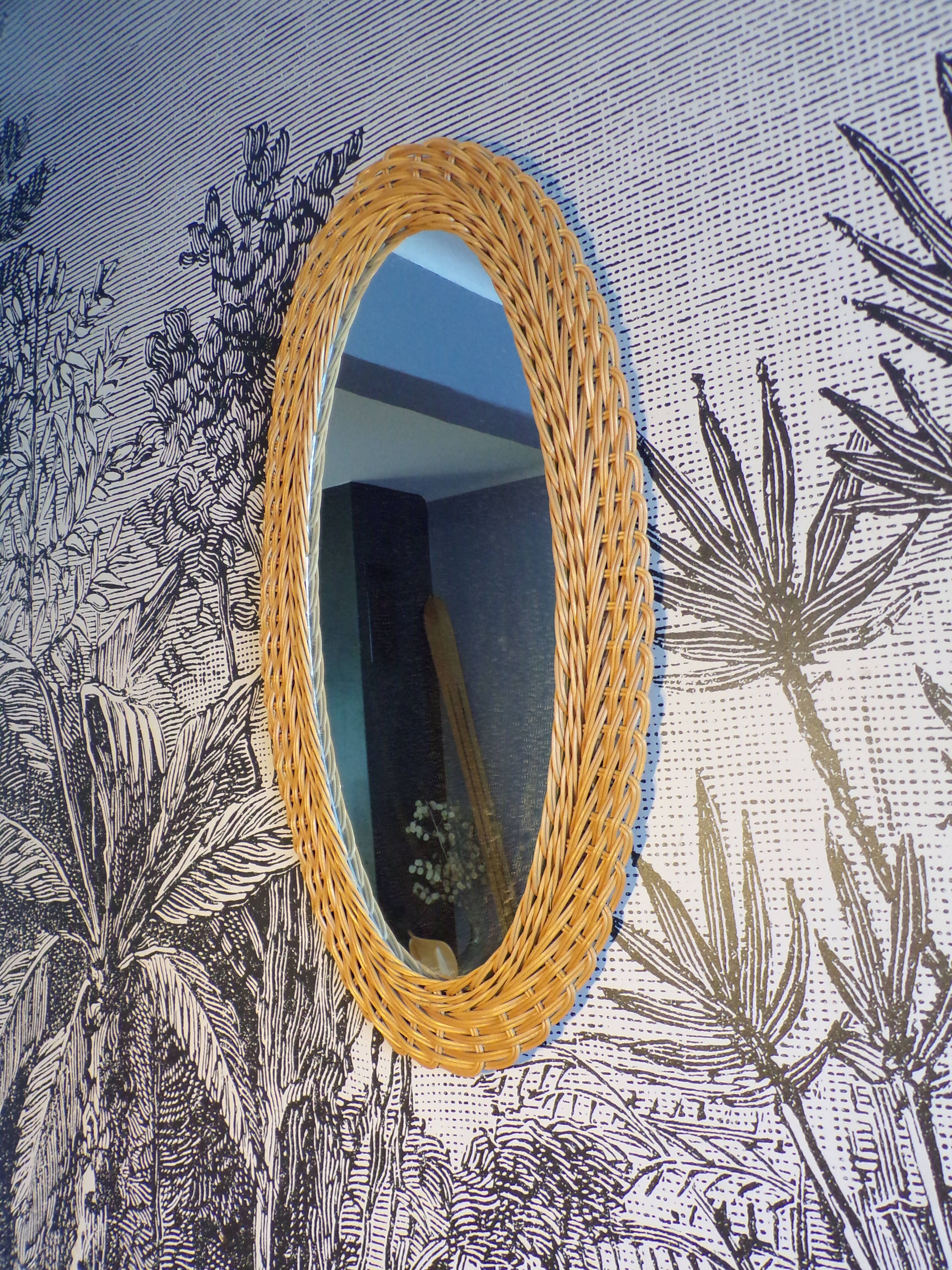 Oval rattan mirror