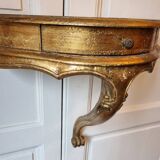 Mid-19th century wall console in wood and gilded stucco