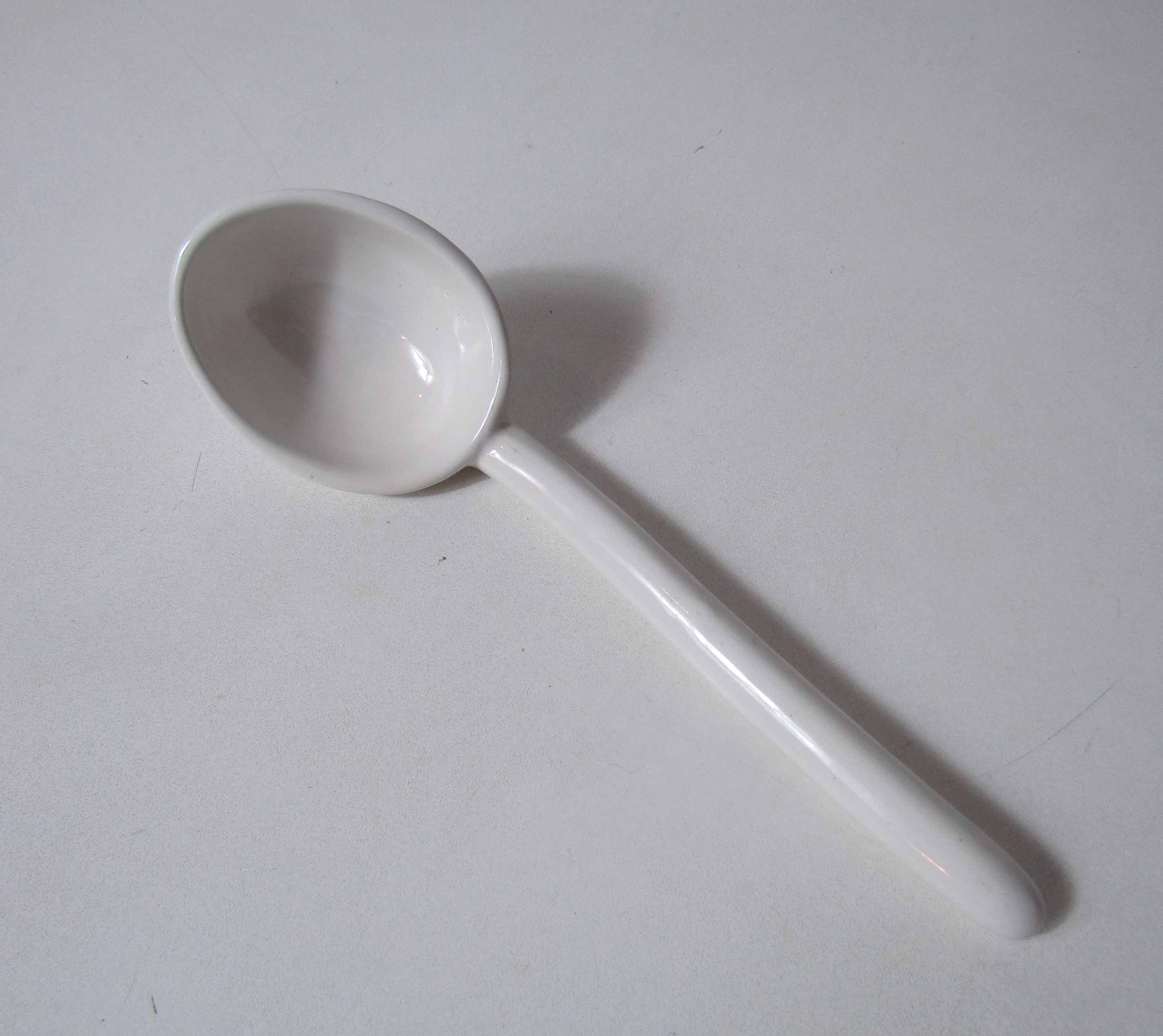 Ladle in white ceramic