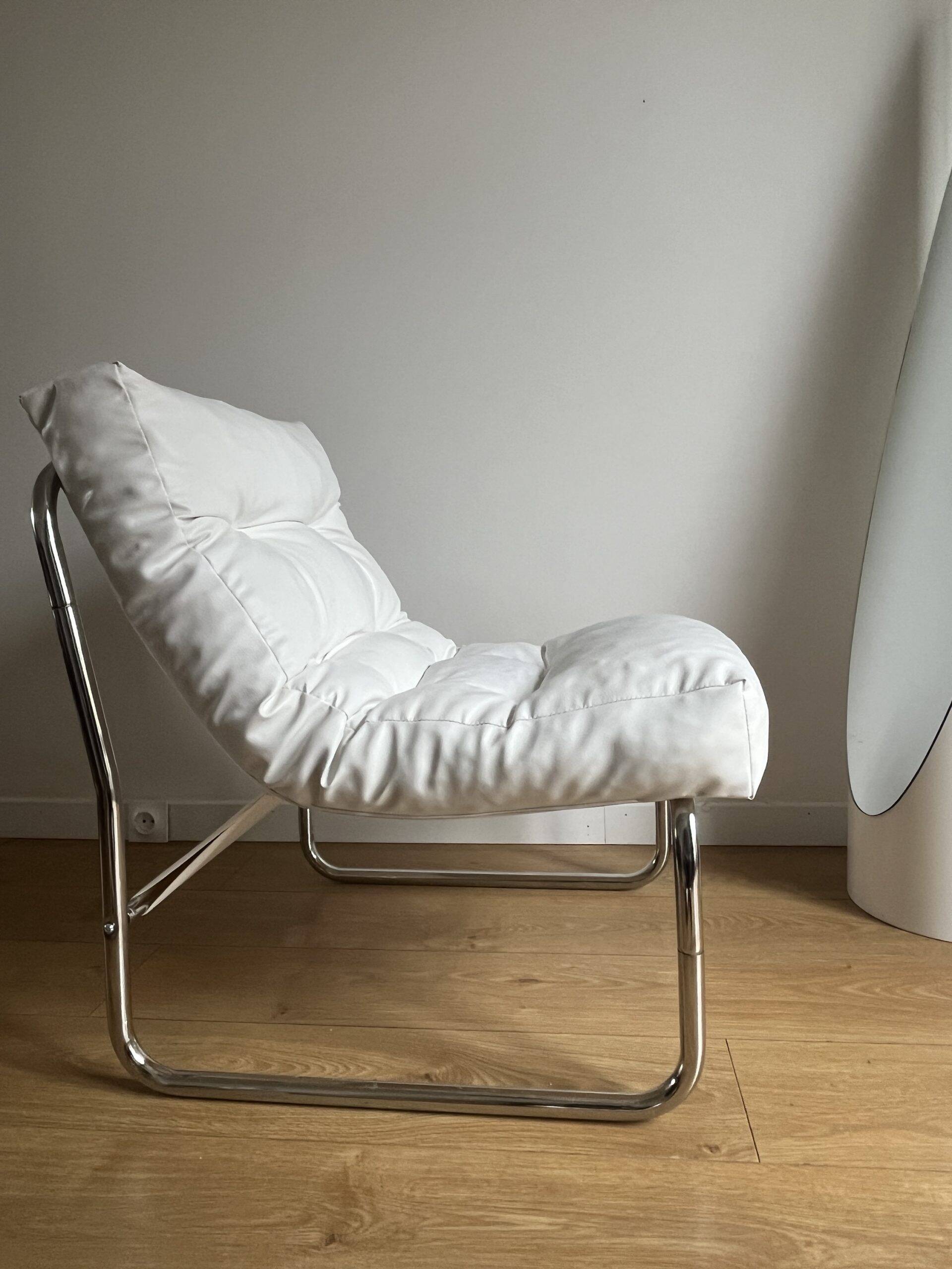 White faux leather armchair by Christian Koban for DOM edition