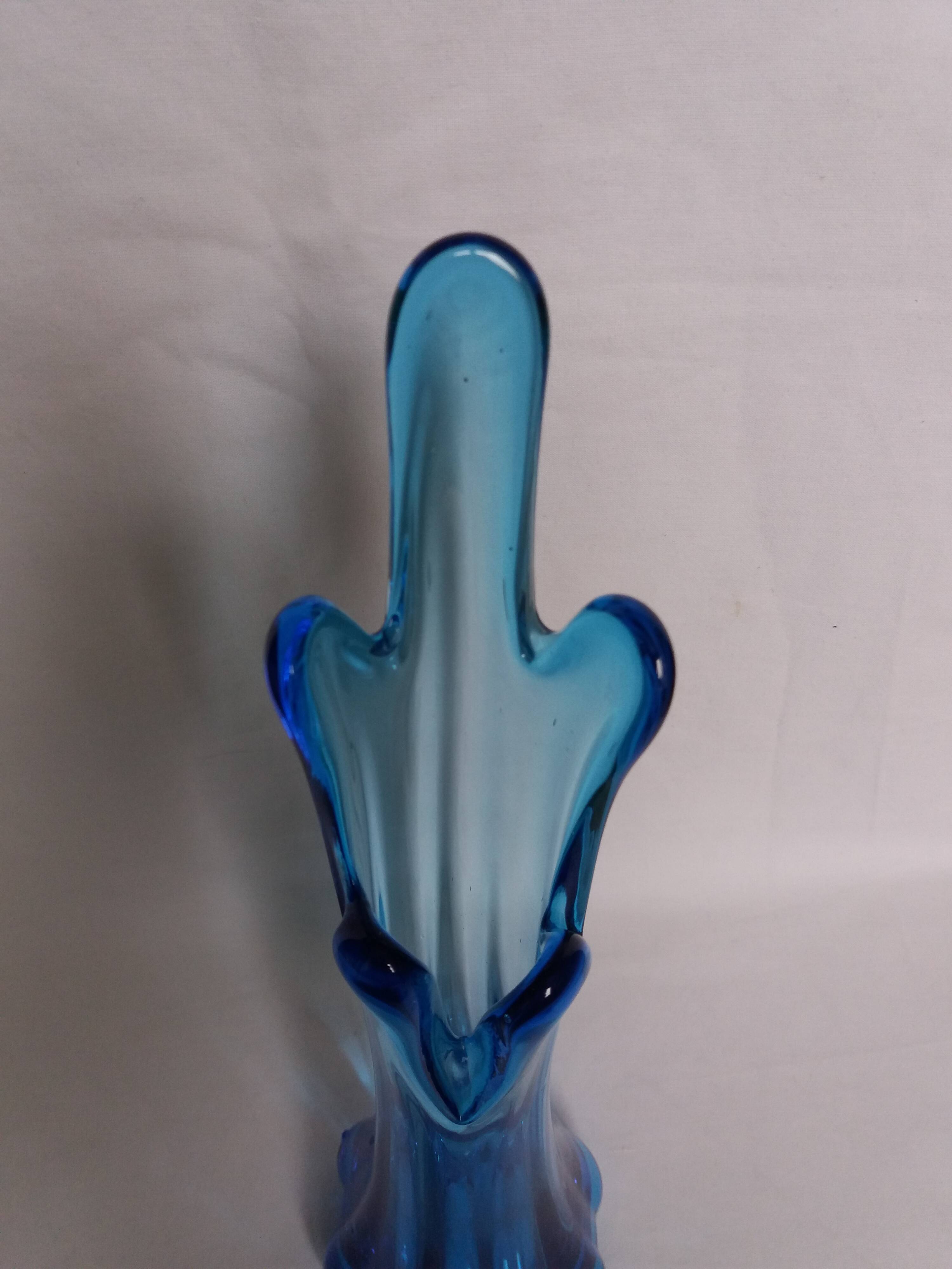Turquoise blue blown glass vase