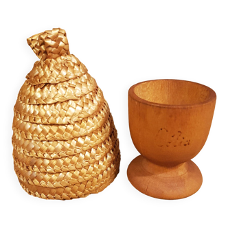 Wooden egg cup and straw egg cover