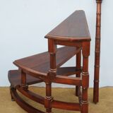 Spiral staircase for library made of mahogany wood