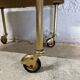 Vintage bedside table with wheels