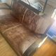 Vintage colonial-style bench in solid wood and patinated leather.