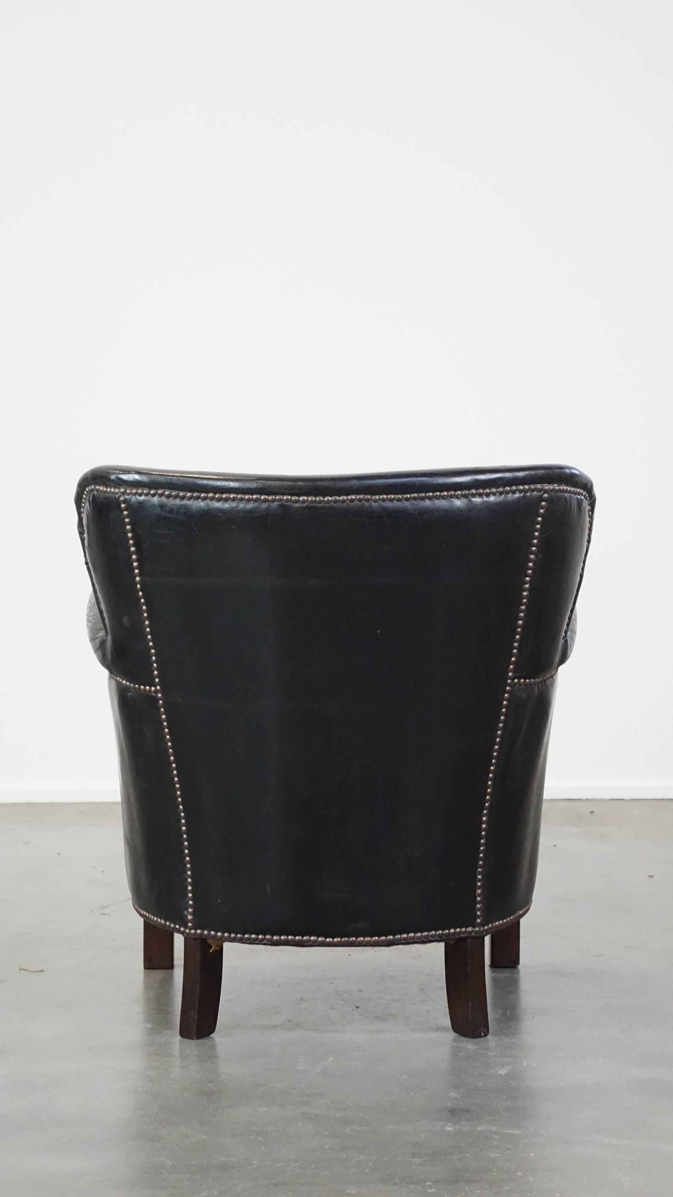Fauteuil en cuir de vachette noir