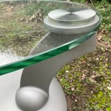 Naos designer coffee table in tempered glass and cast iron