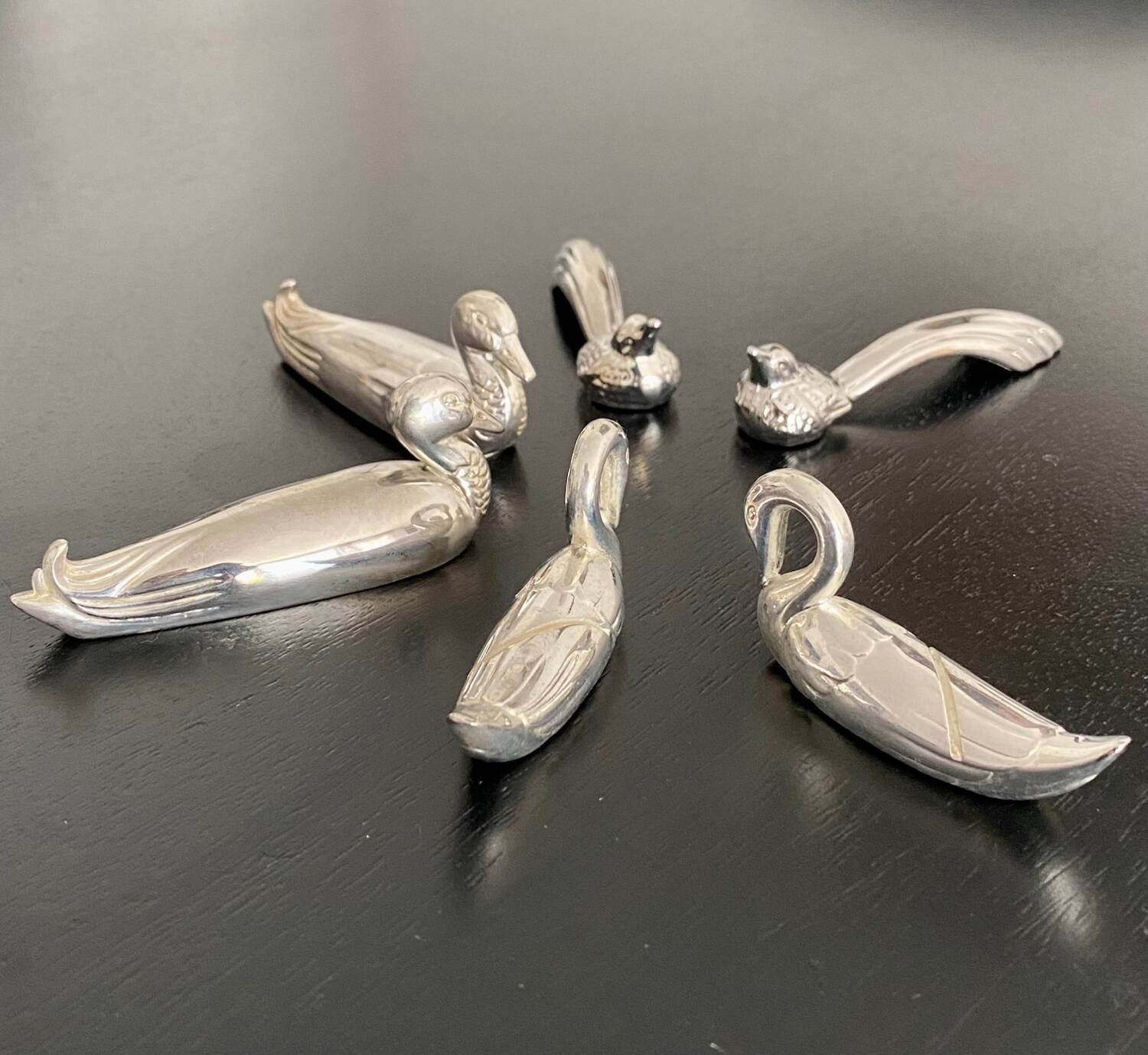 6 various animal shaped knife holders in silver metal
