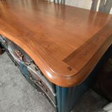 Patinated crossbow chest of drawers