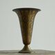 Art Deco fluted vase in patinated metal and brass from the 1930s.