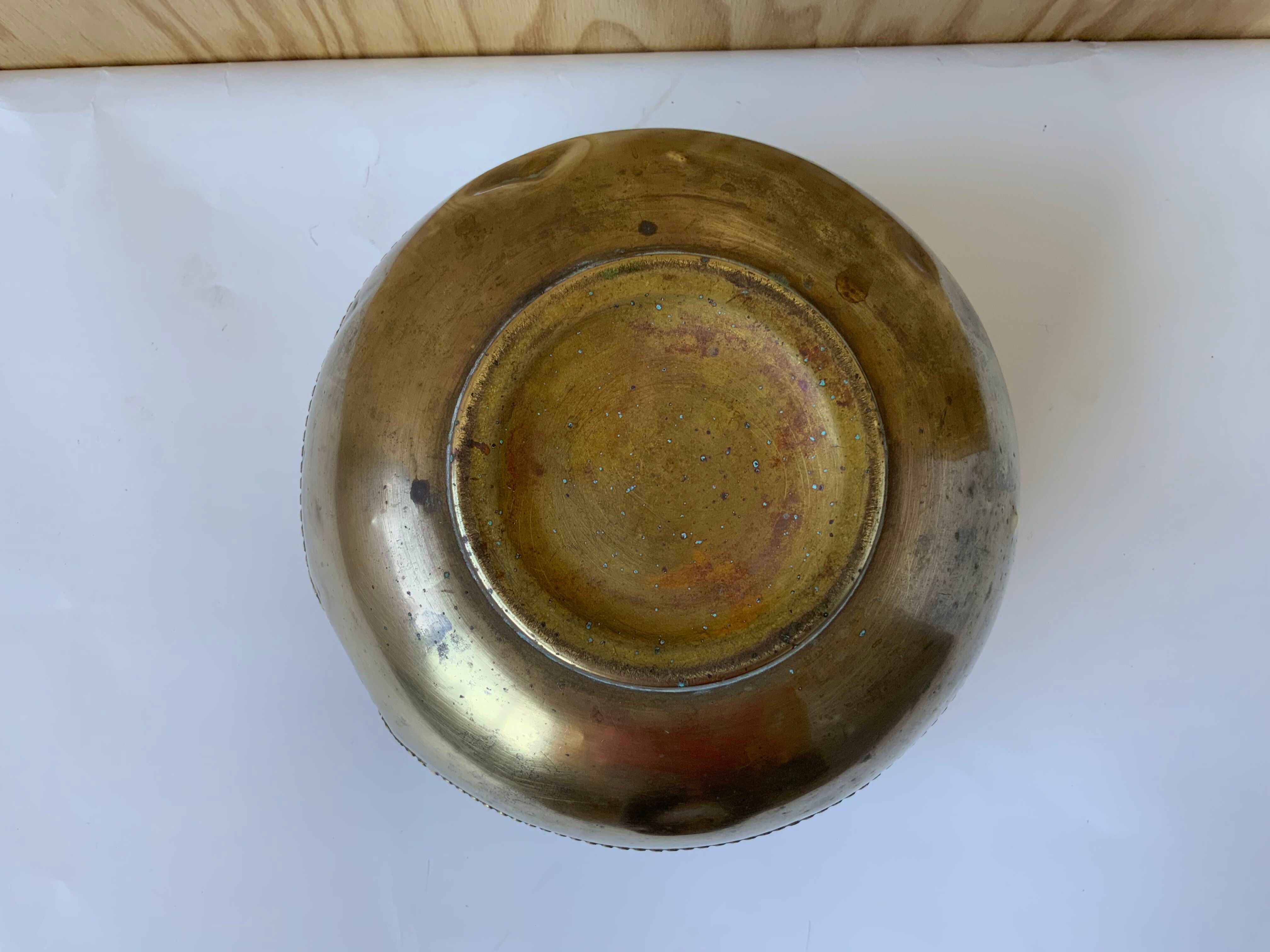 Brass pot cover