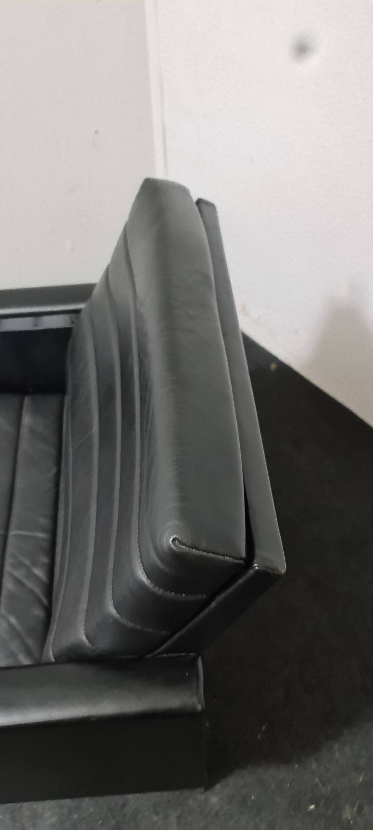 Vintage black leather armchair by Stoll Geroflex