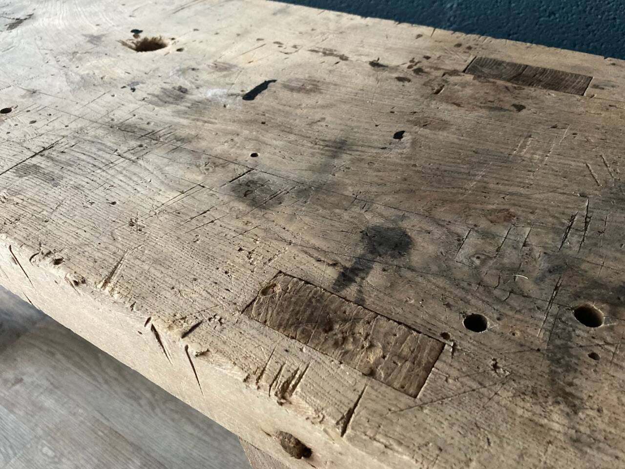 Old workbench with inclined legs