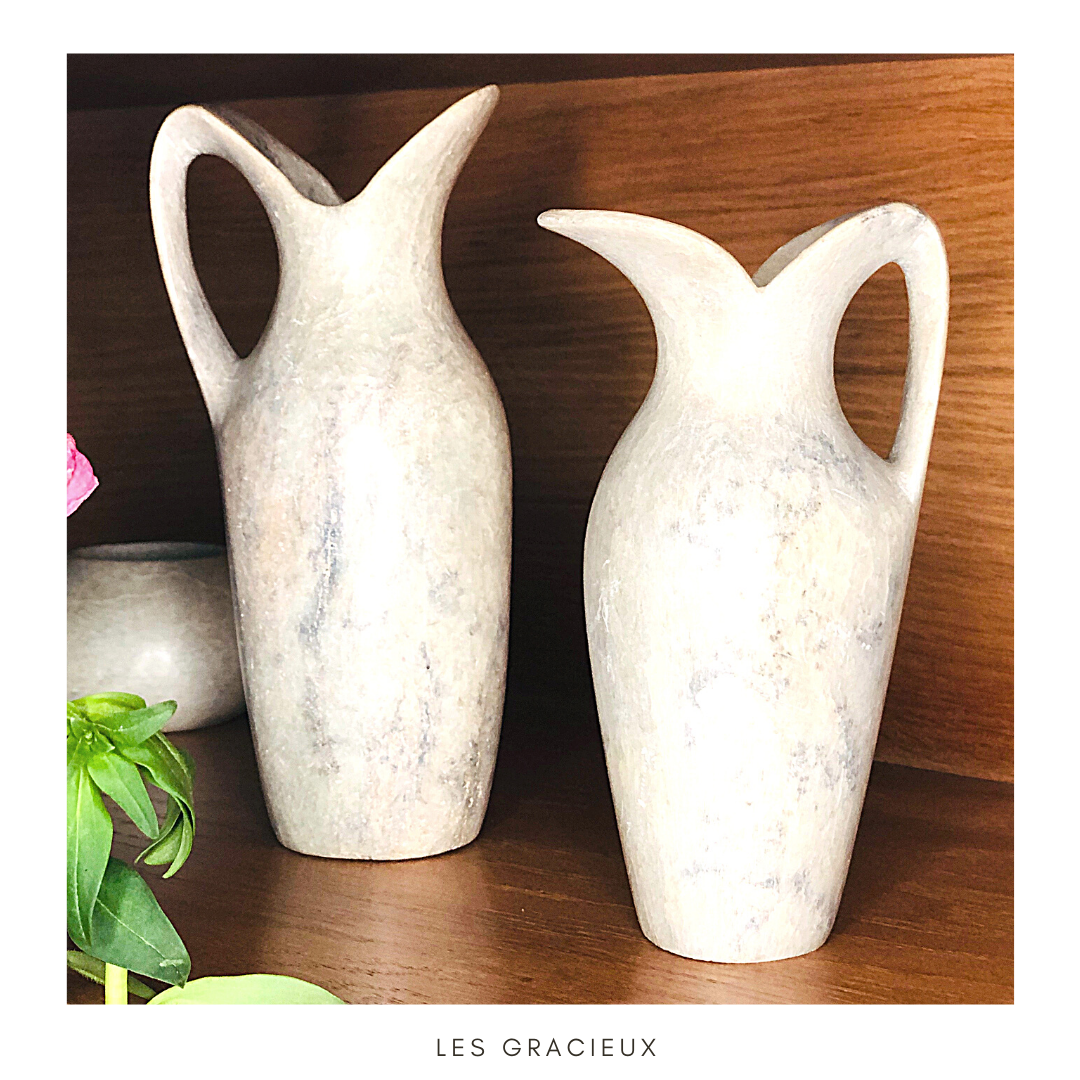 2 jugs in rough cut stone