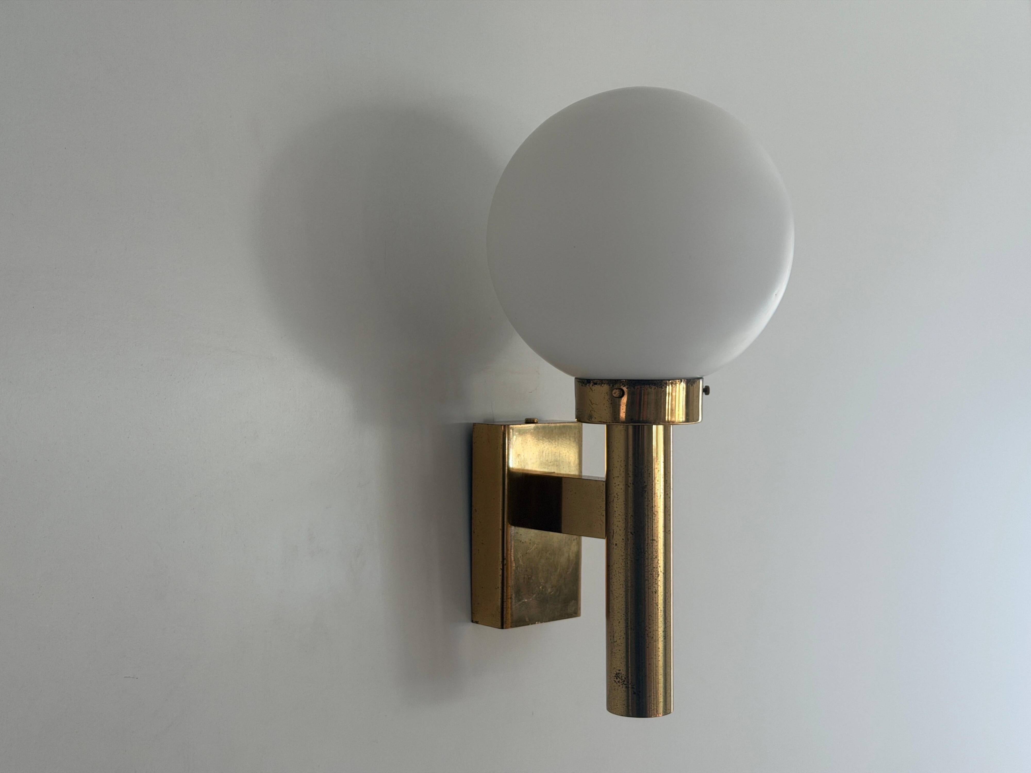 Large minimalist cinema wall light in opal glass and heavy brass, 1960s, Germany
