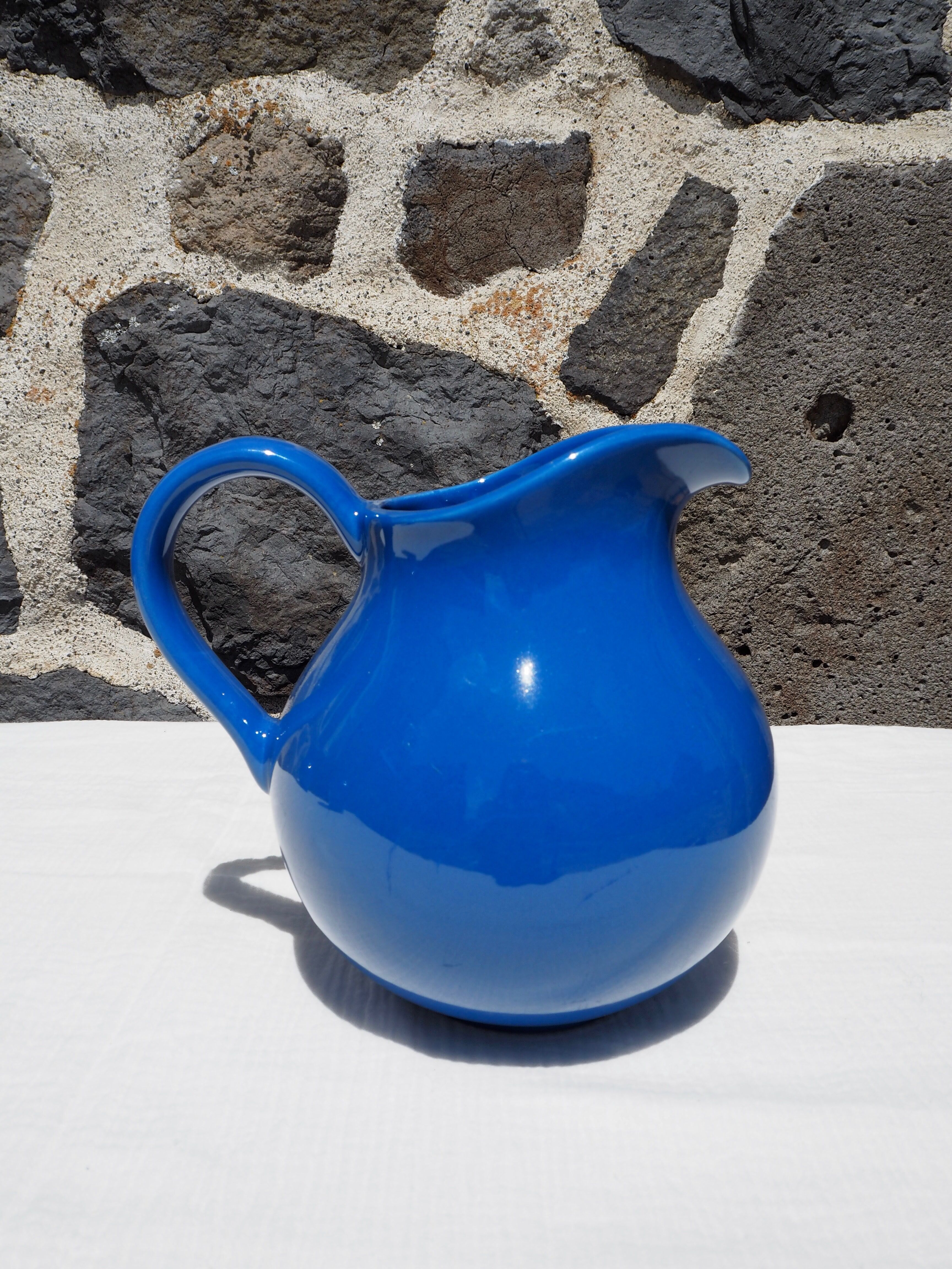 Blue ceramic belly pitcher