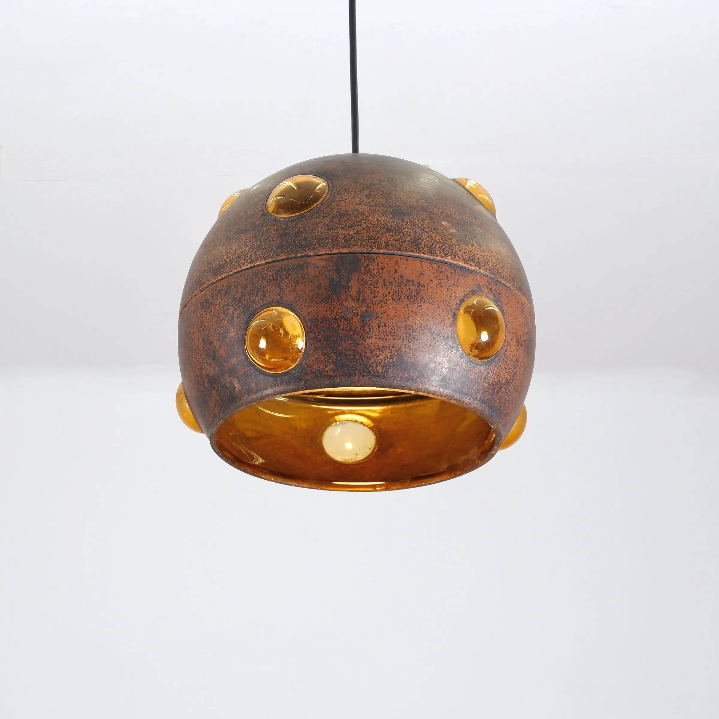 Large, globular brutalist hanging lamp in copper / glass by Peill & Putzler