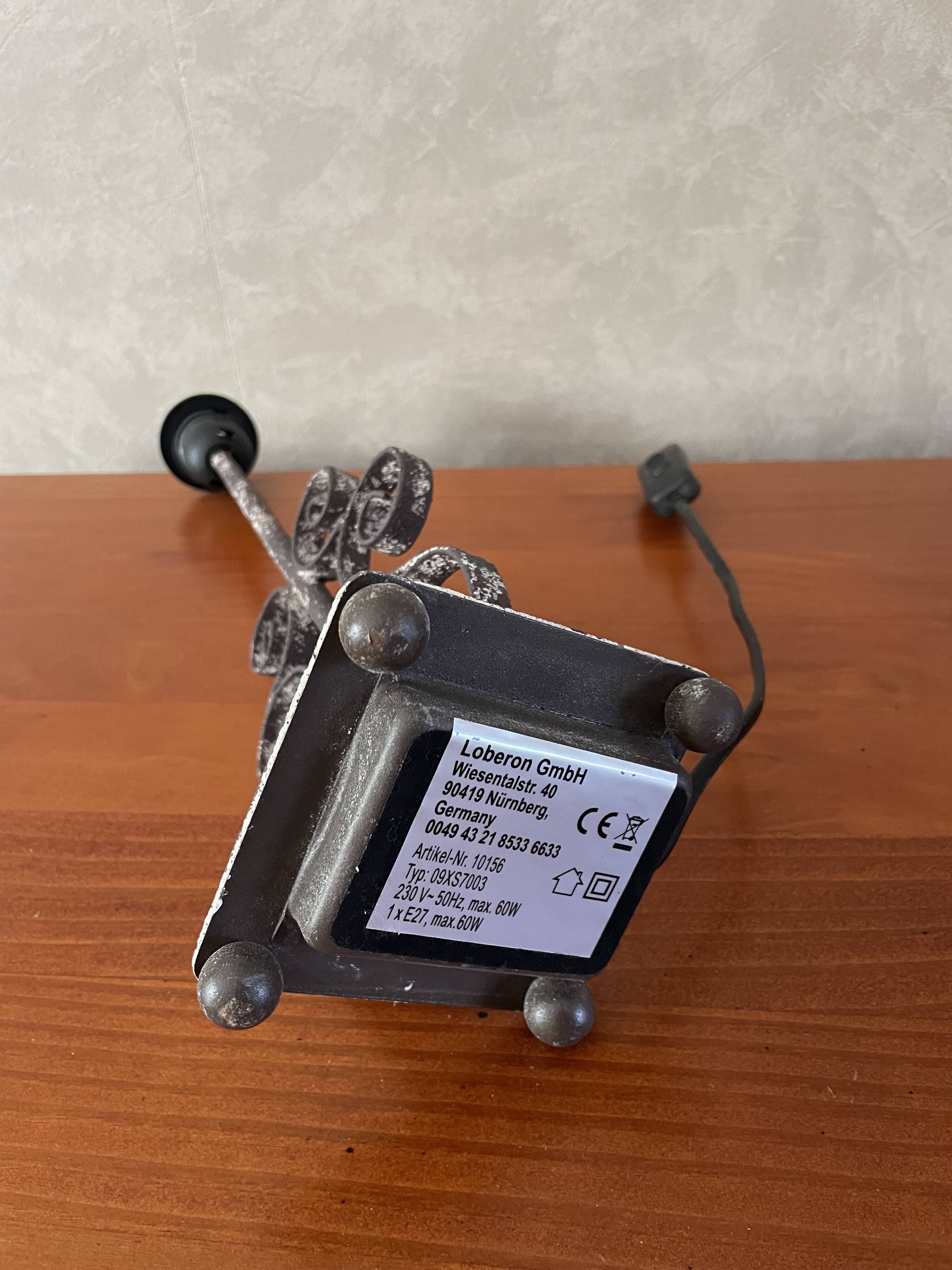 Decorative lamp with wrought iron base Loberon