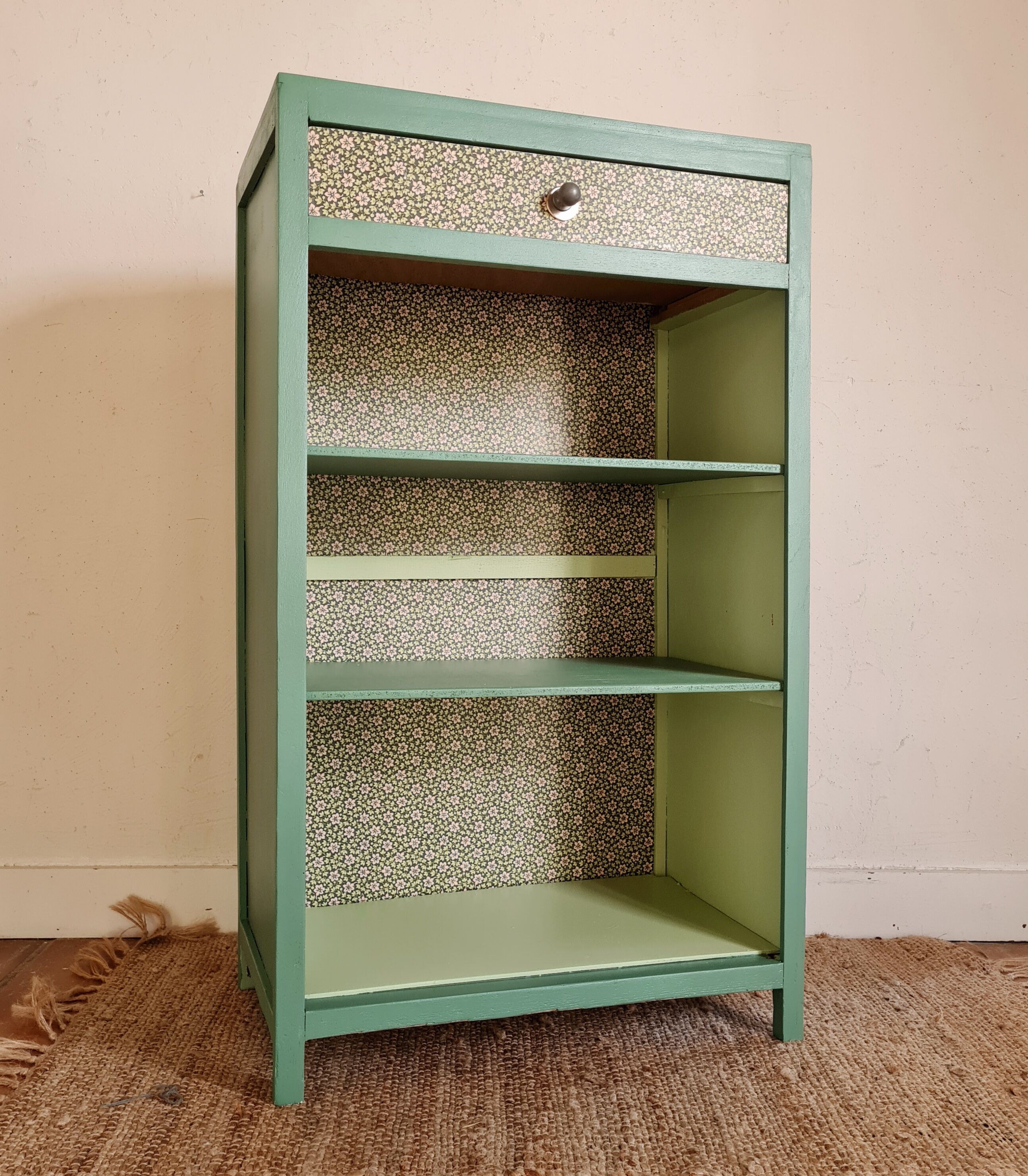 Renovated library shelf green color and floral atmosphere