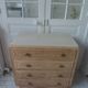 Vintage oak chest of drawers, a travertine plate laid for tray.